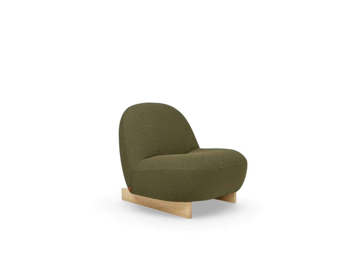 urbane EQ3 Arlo chair in olive green bouclé fabric with a solid oak sled base and curved, compact design.