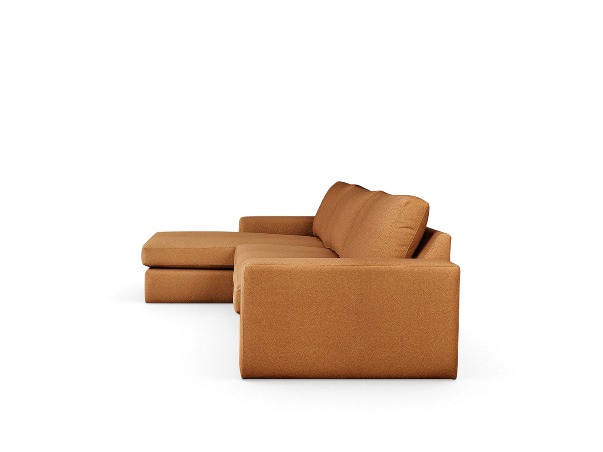urbane EQ3 Ashdale sectional sofa in a warm tan fabric with track arms and a chaise lounge in a minimalist style