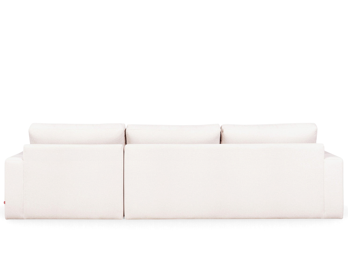 urbane EQ3 Ashdale sectional sofa in a light beige fabric with a minimalist design and track arms, back view