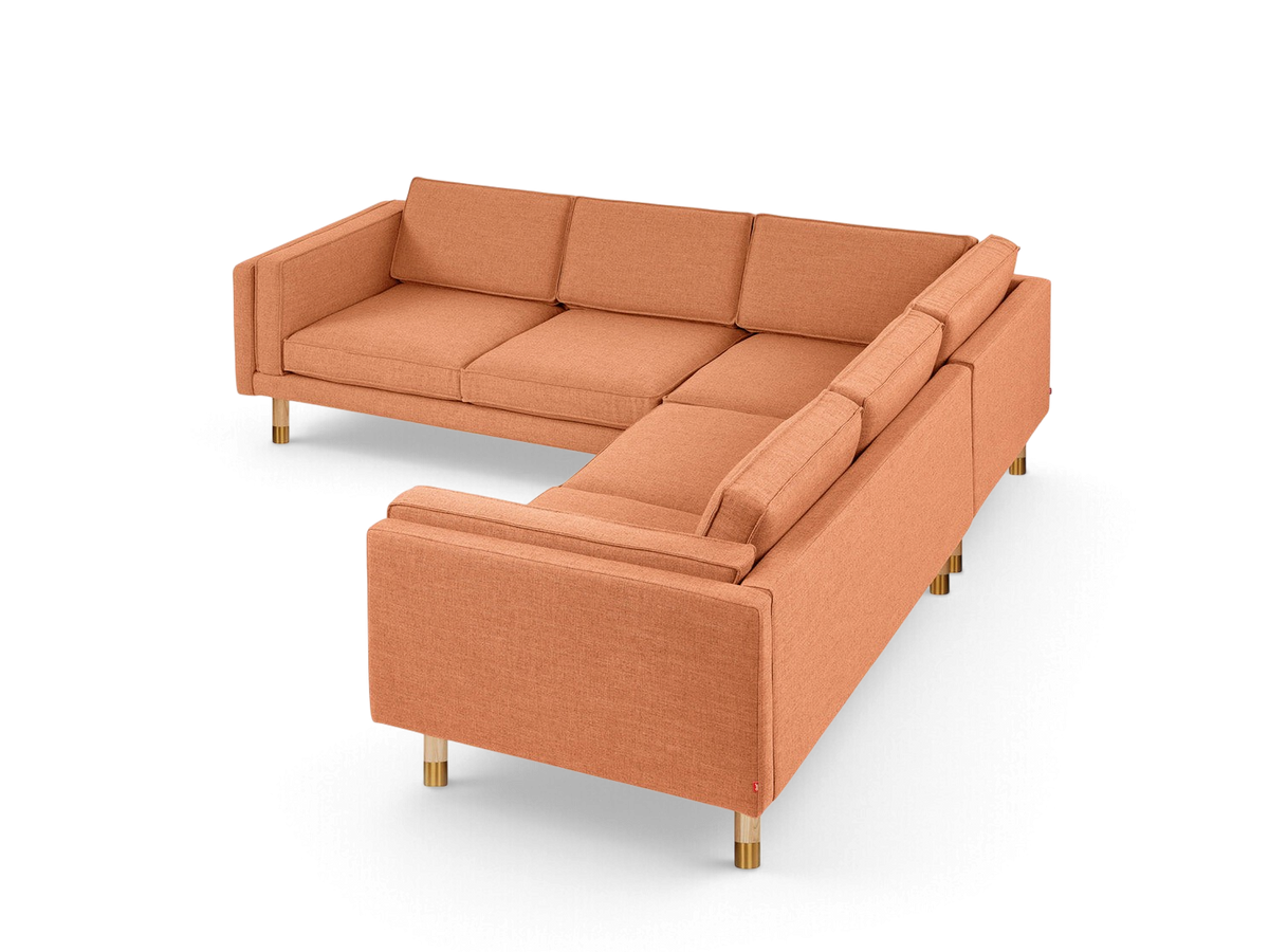 urbane EQ3 Augusta Bi-Sectional sofa in orange linen with French-seam detailing and natural ash wood legs