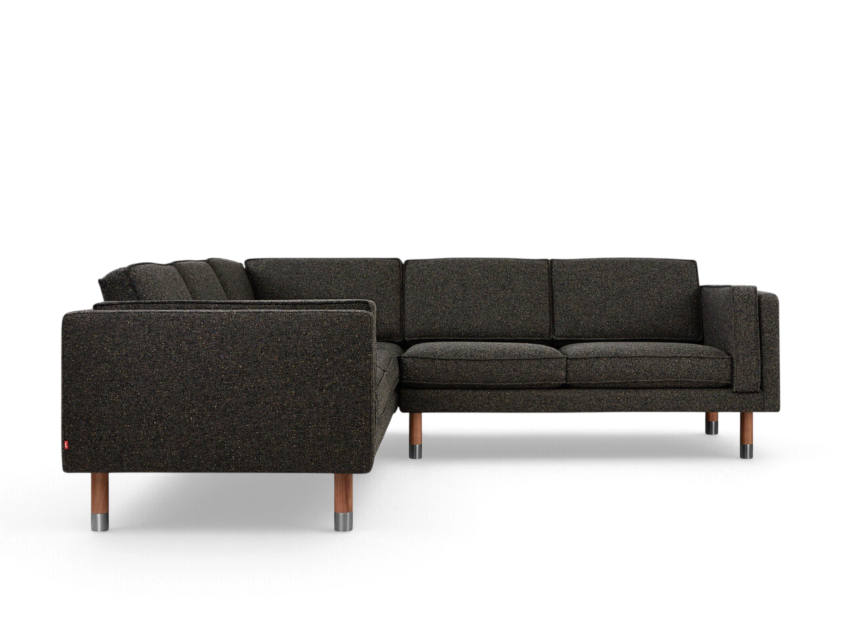 urbane EQ3 Augusta Bi-Sectional in dark textured fabric with walnut finish legs and pewter metal accents