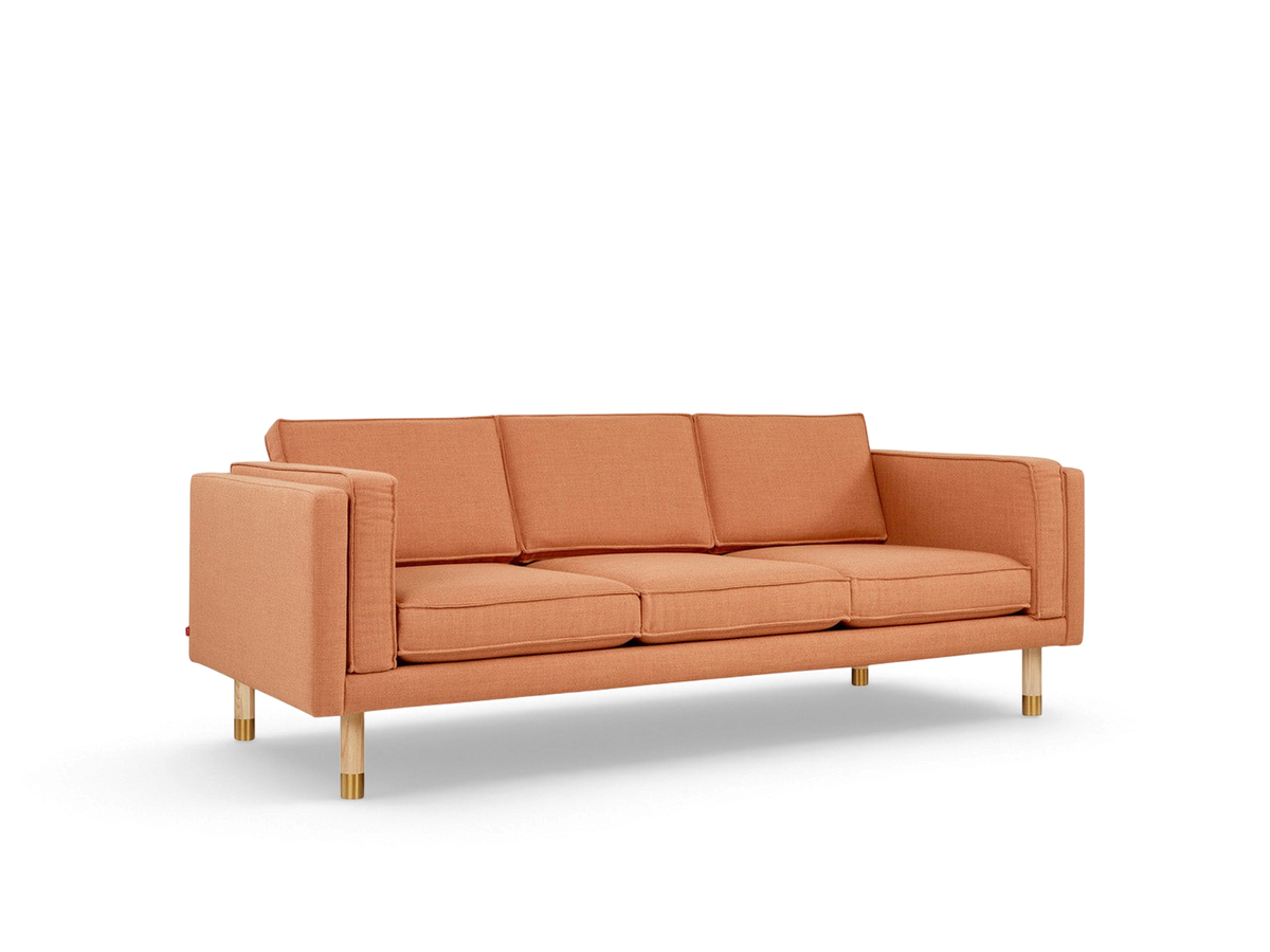 urbane EQ3 Augusta 3-seater club sofa in orange linen fabric with solid wood legs and brass metal detailing
