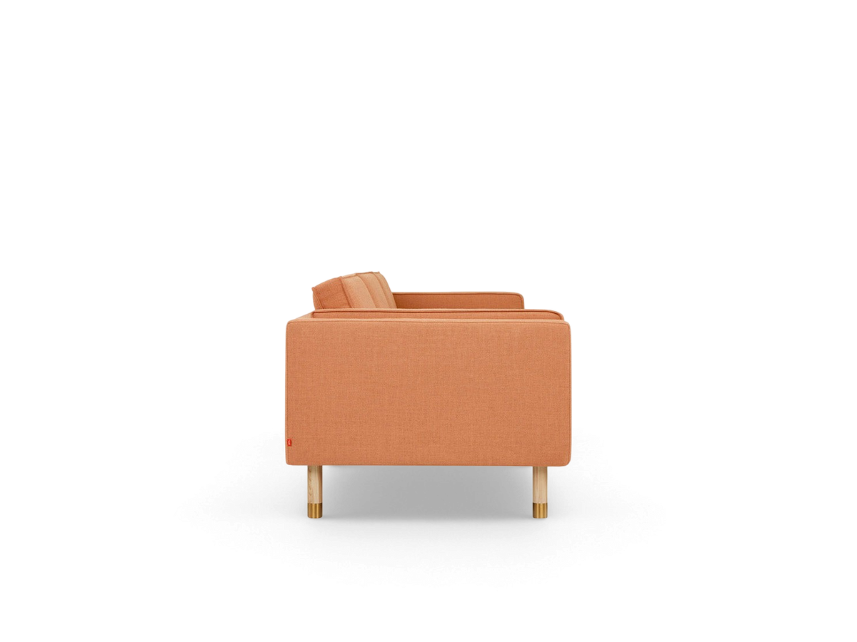urbane EQ3 Augusta 3-over-3 club sofa in orange linen fabric with solid wood legs and brass metal detailing side view