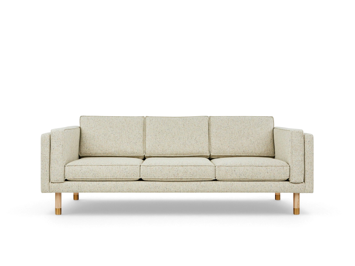 urbane EQ3 Augusta 3-seater club sofa in light speckled linen fabric with natural ash wood and brass detail legs