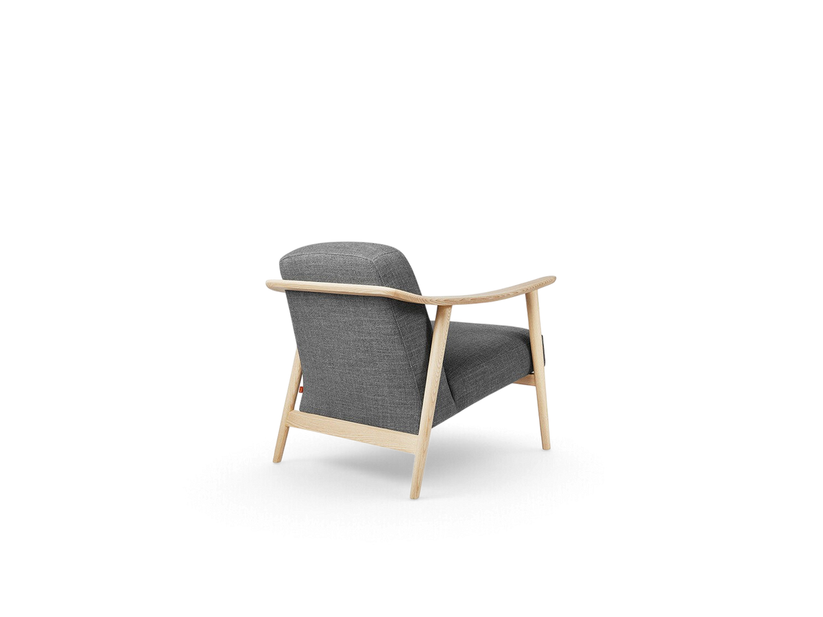 urbane EQ3 Baltic Chair with a light ash wood frame and grey upholstered seat viewed from the back