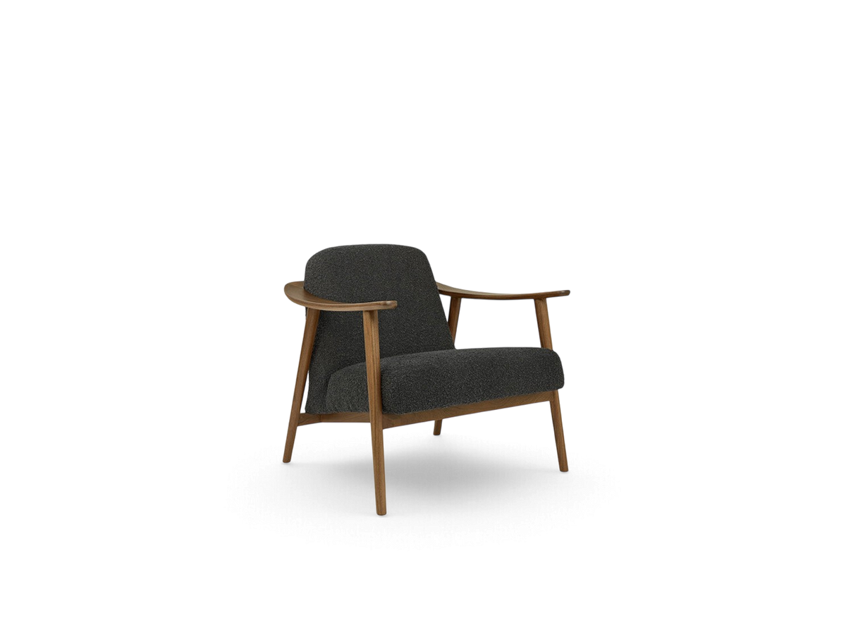 urbane EQ3 Baltic Chair with a dark grey upholstered seat and a solid walnut wood frame featuring curved armrests.