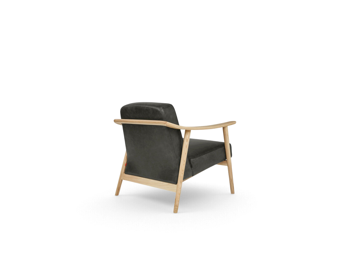 urbane EQ3 Baltic Chair with a light ash wood frame and dark grey upholstered seat, viewed from the back