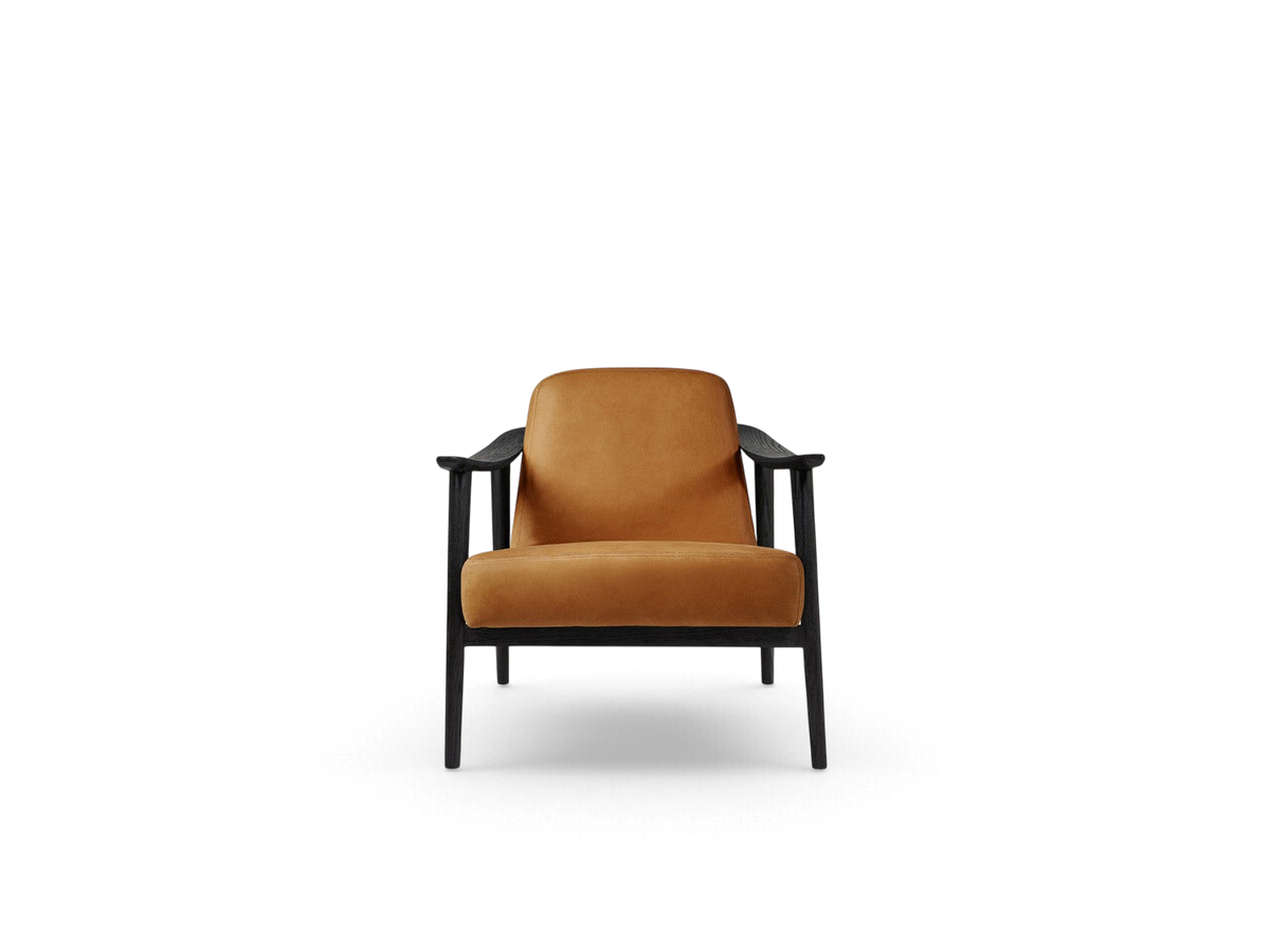 urbane EQ3 Baltic Chair with a black solid wood frame and tan upholstered seat and back in a minimalist style