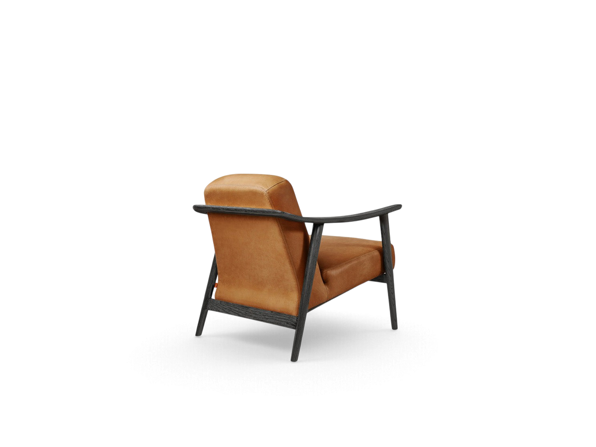 urbane EQ3 Baltic Chair with tan leather upholstery and a dark solid wood frame, viewed from the back
