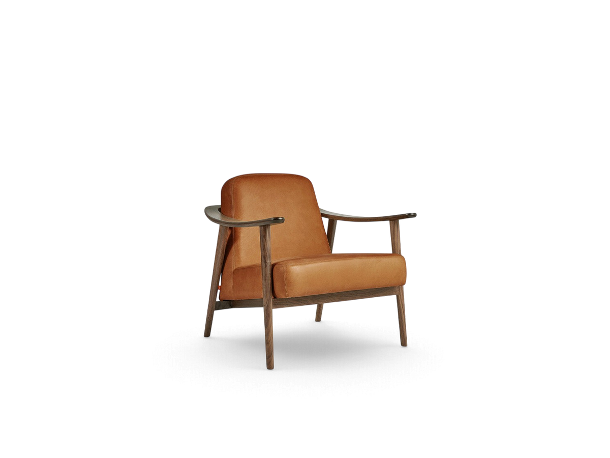 urbane EQ3 Baltic Chair featuring a cognac leather seat and a sculptural dark walnut wood frame in a Nordic style.