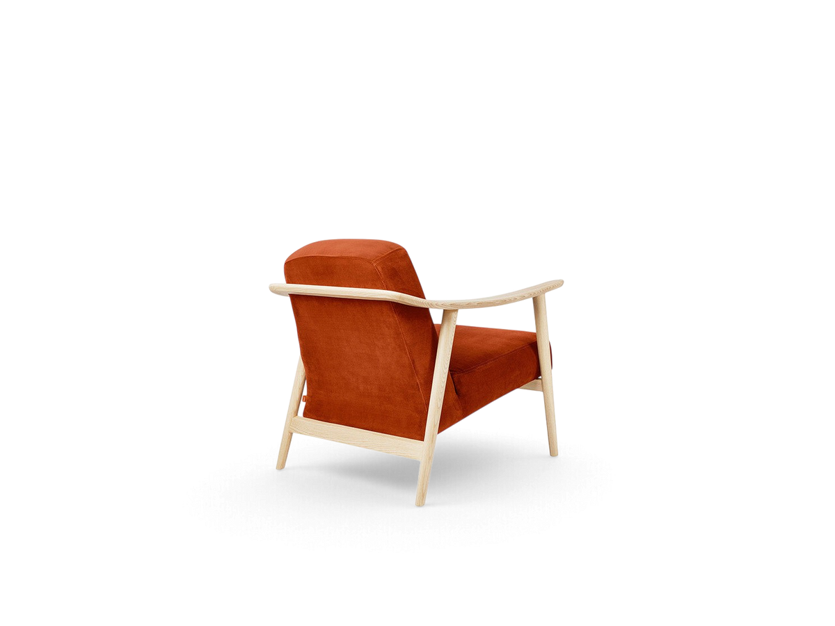 urbane EQ3 Baltic Chair in rust orange fabric with a light ash wood frame, shown from a rear angle.