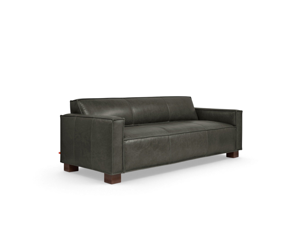 urbane EQ3 Cabot sofa in dark grey top grain aniline leather with French seam detailing and walnut block feet