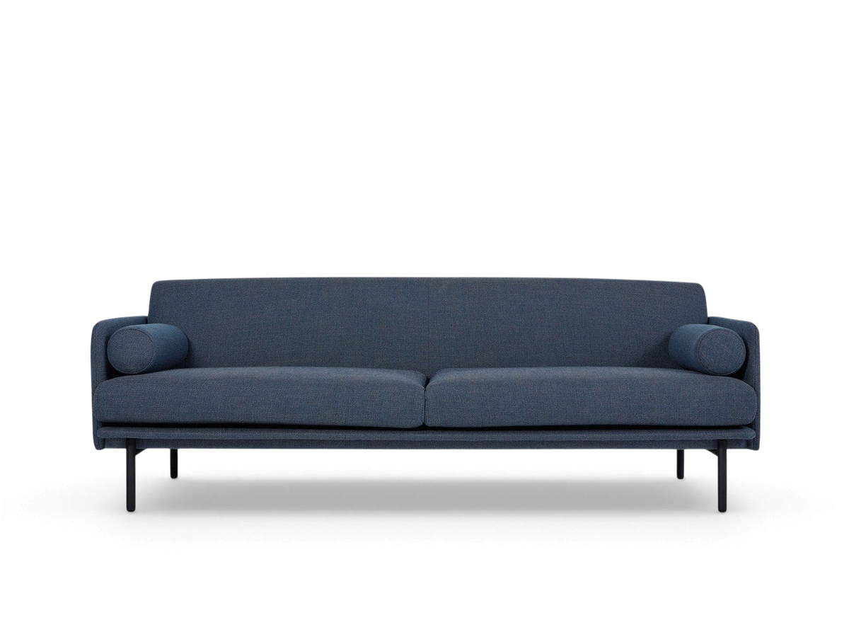 urbane EQ3 Foundry Sofa in blue fabric with a tightback frame, two bolster cushions, and black steel legs.
