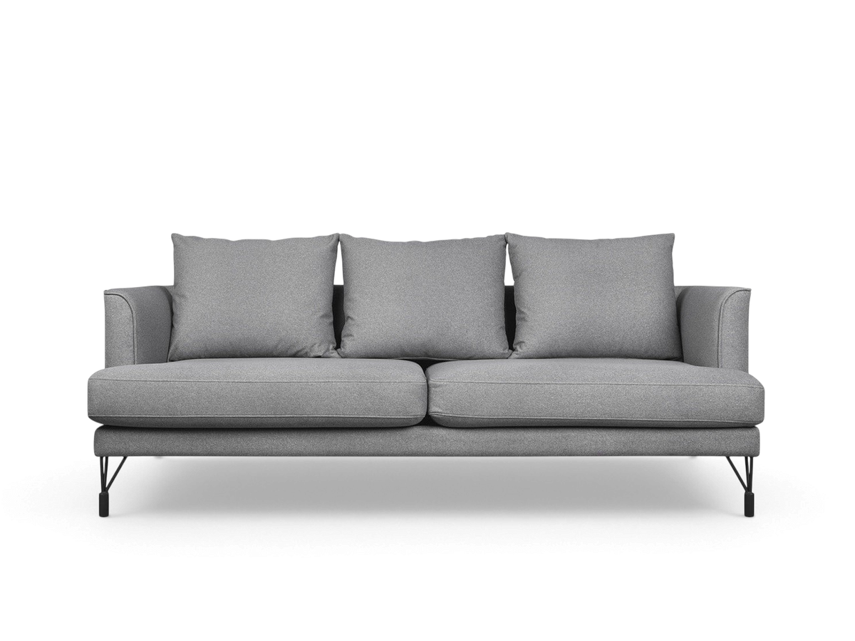 urbane EQ3 Highline Sofa in grey fabric with curved arms, French-seam detailing, and slim architectural metal legs.