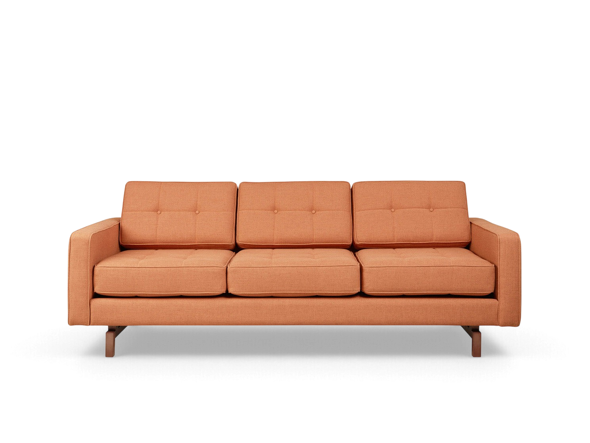 urbane EQ3 Jane 2 sofa in orange fabric with button-tufted cushions and a dark wood inset base