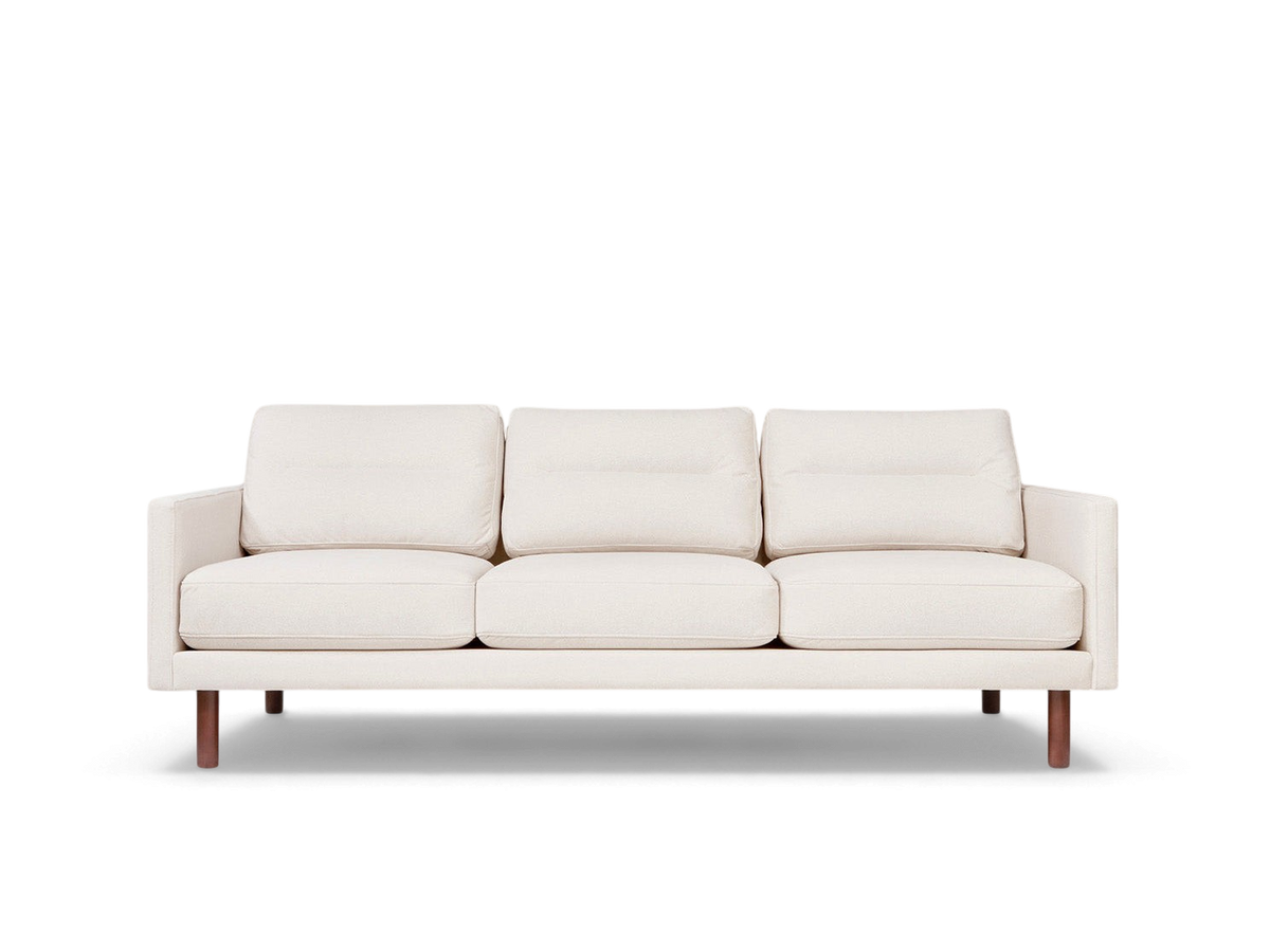 urbane EQ3 Miller sofa in off-white fabric with channel-stitched back cushions and walnut-finished solid wood legs