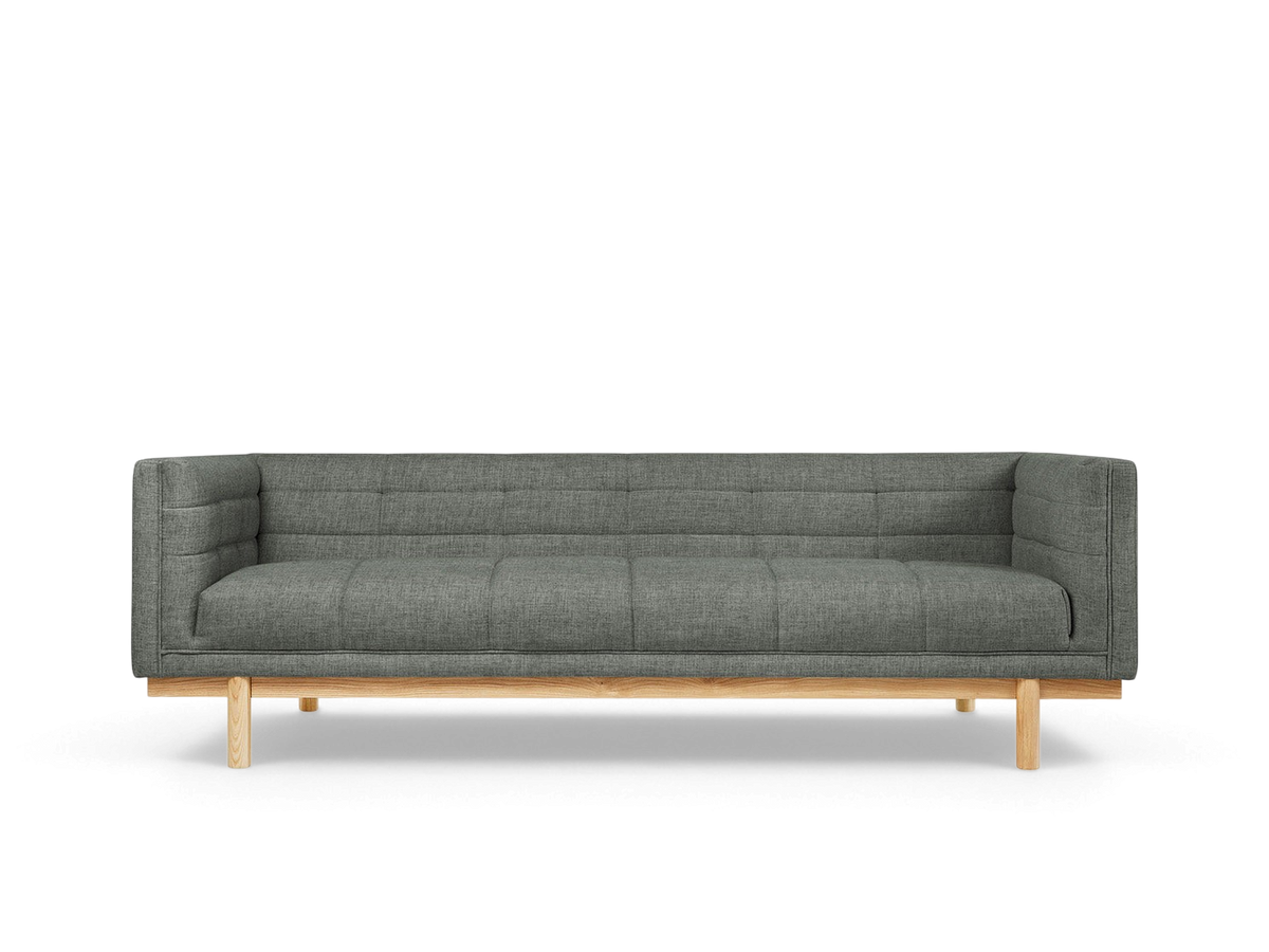 urbane EQ3 Mulholland Sofa in grey fabric with blind-tufting and a solid ash wood base on a white background
