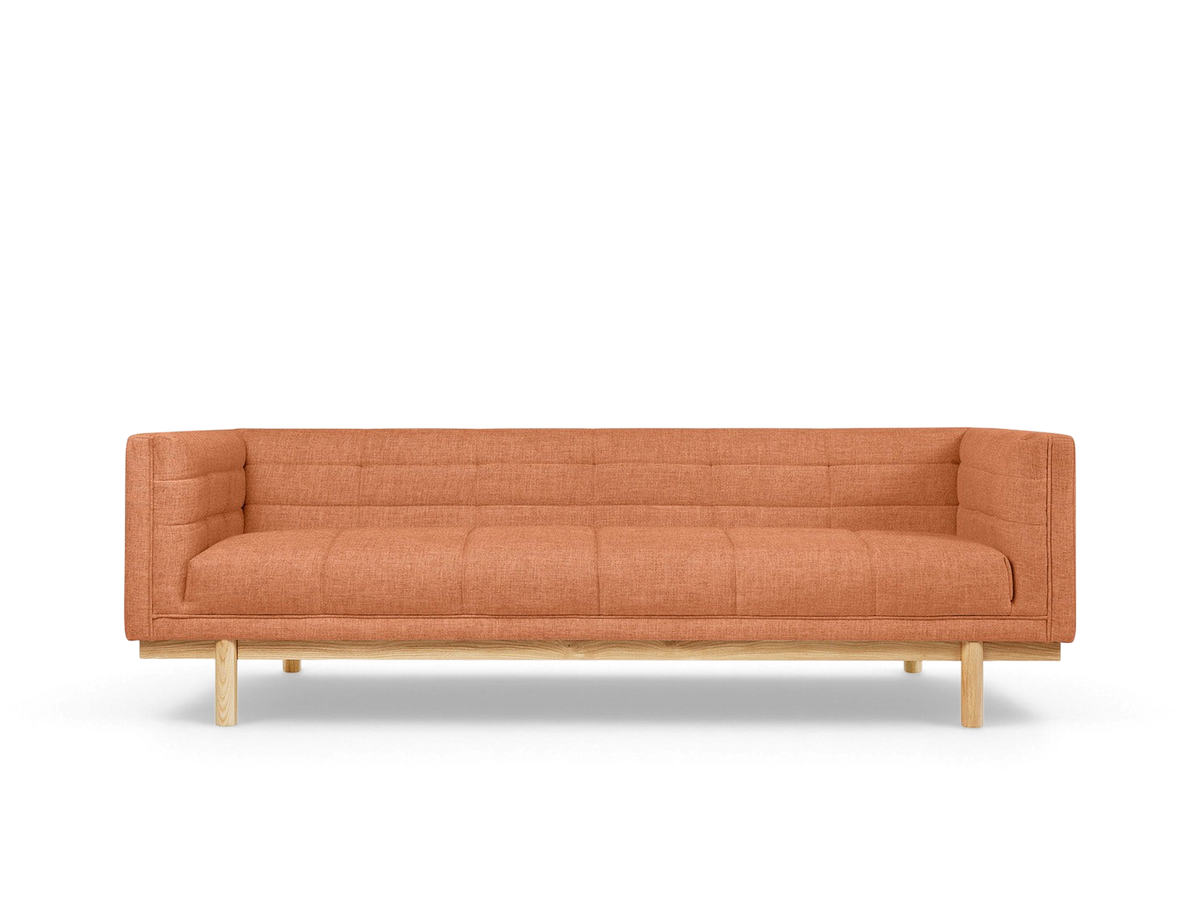 urbane EQ3 Mulholland sofa in burnt orange fabric with blind-tufting and solid ash wood base