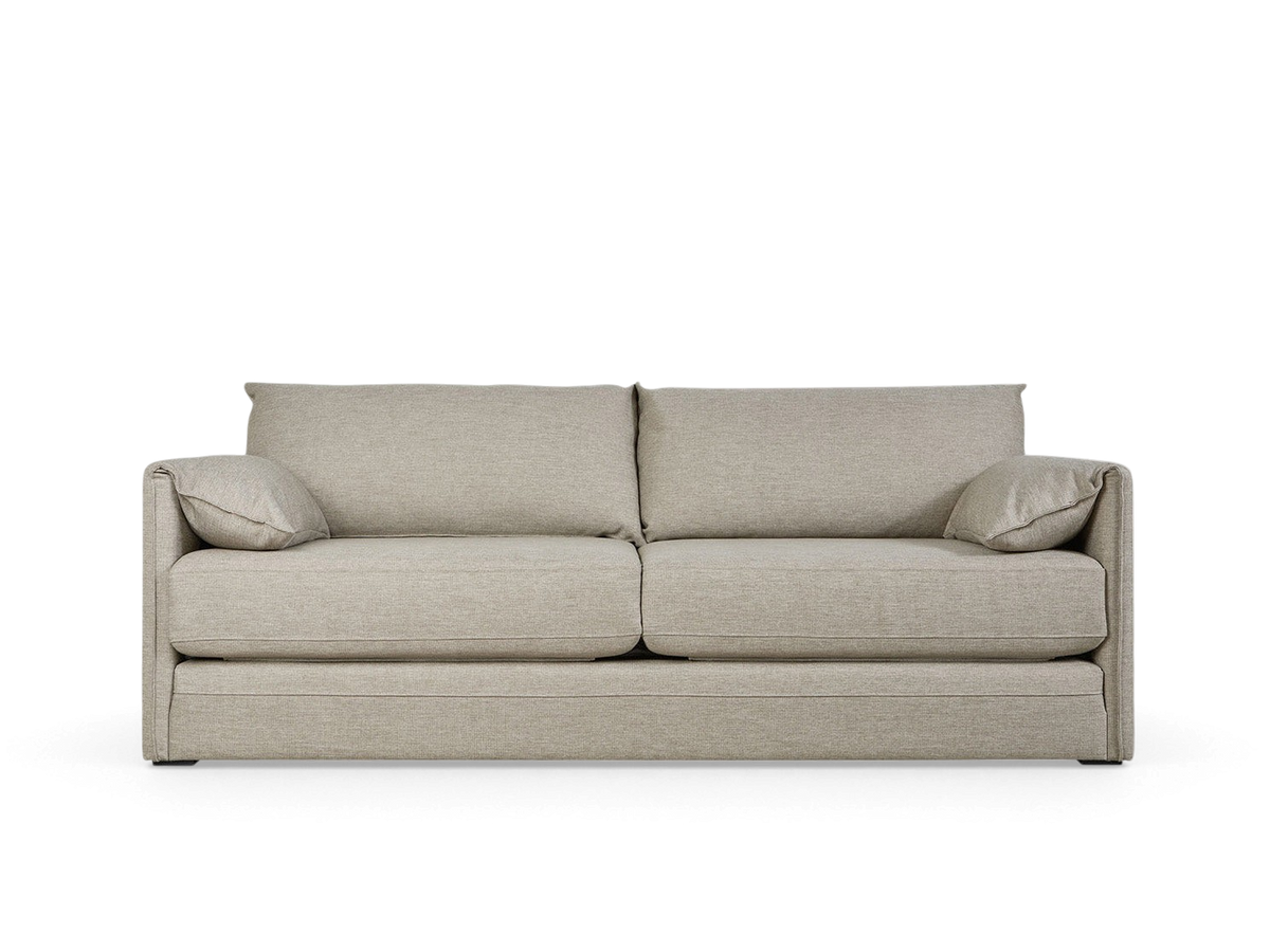 urbane EQ3 Neru Sofabed in a neutral fabric with slender arms, integrated bolsters, and French-seam detailing.