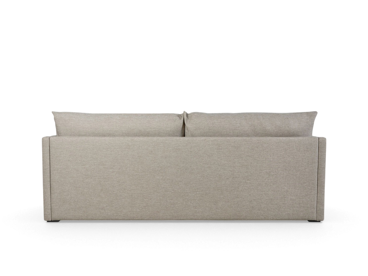 urbane EQ3 Neru Sofabed in light grey fabric, showing the clean, minimalist back view with slender arms.