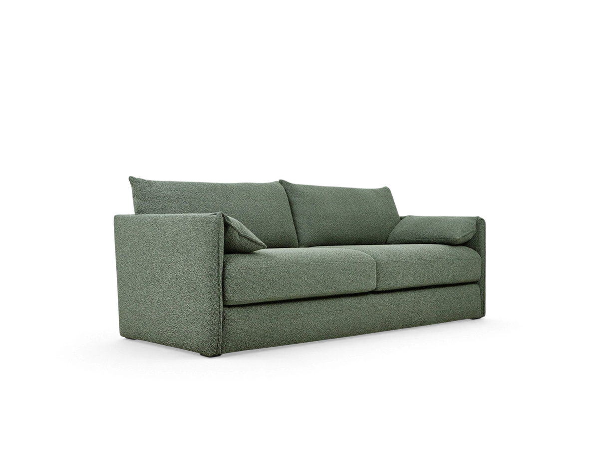 urbane EQ3 Neru Sofabed in sage green textured fabric with slender arms, integrated bolsters, and French seam details.