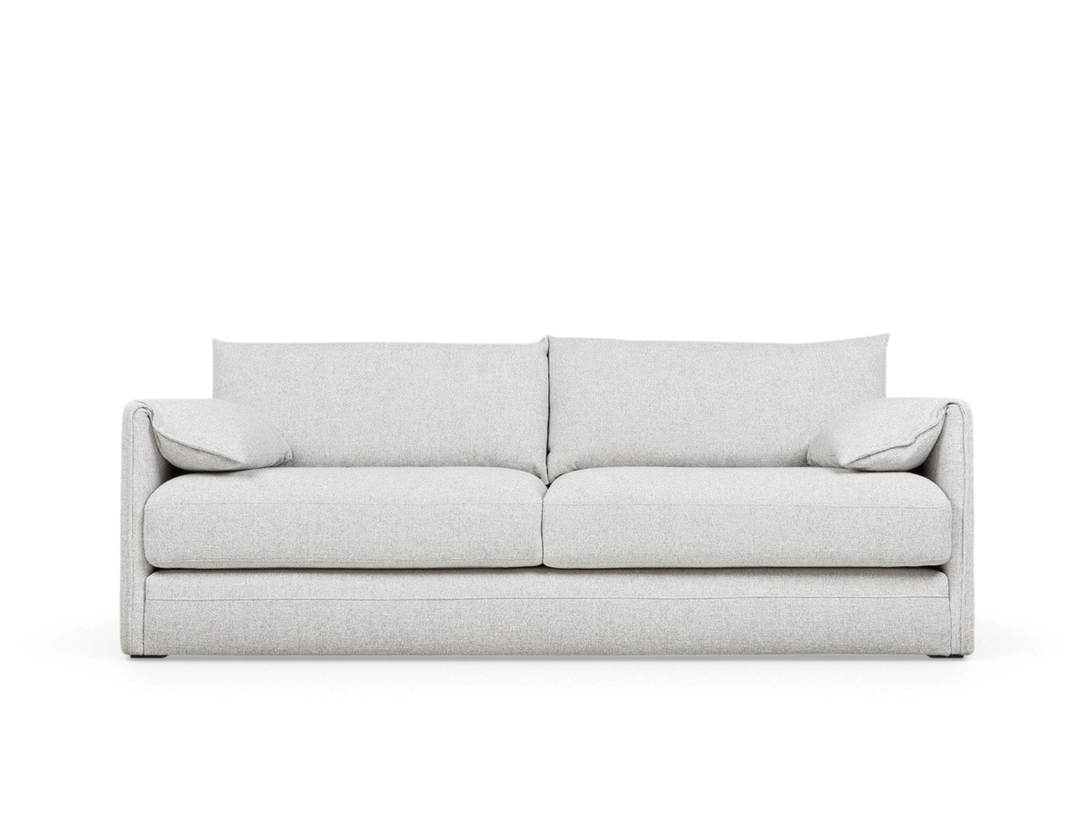 urbane EQ3 Neru Sofabed in light grey fabric with slender arms, French seam detailing, and integrated side bolsters.