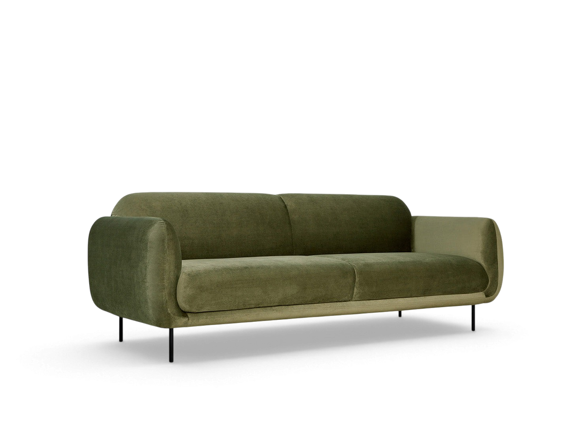 urbane EQ3 Nord Sofa in olive green velvet with a curved silhouette and black steel legs on a neutral background