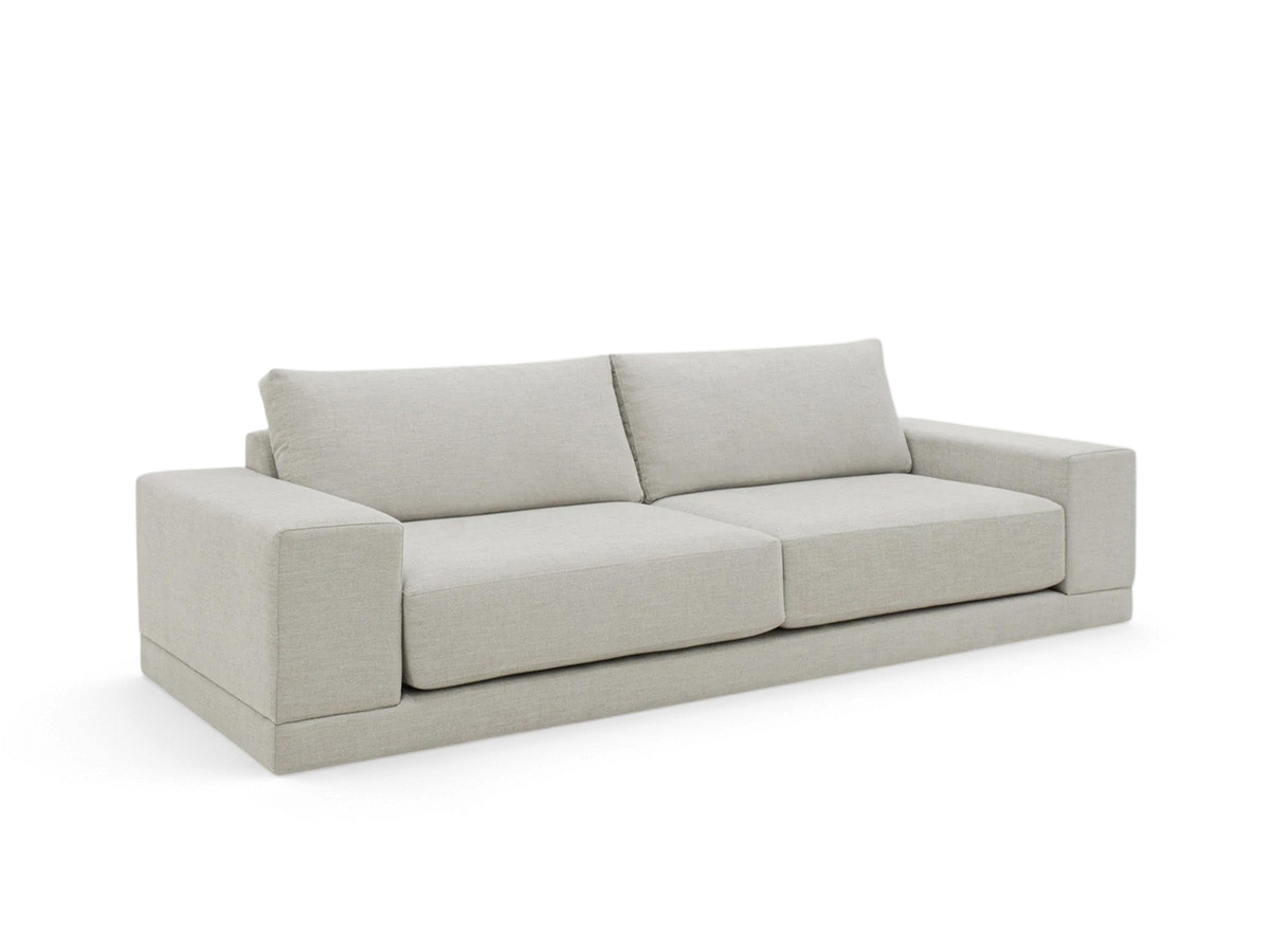 urbane EQ3 Palermo sofa in light beige fabric with a low-profile, modern boxy design and thick seat cushions.