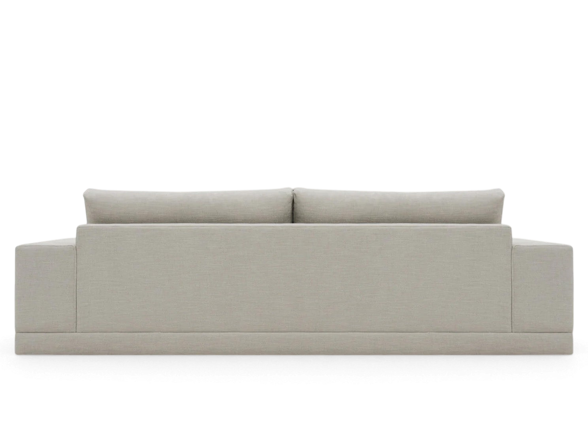 Back view of the urbane EQ3 Palermo sofa in a neutral fabric featuring clean lines and top-stitched detailing.
