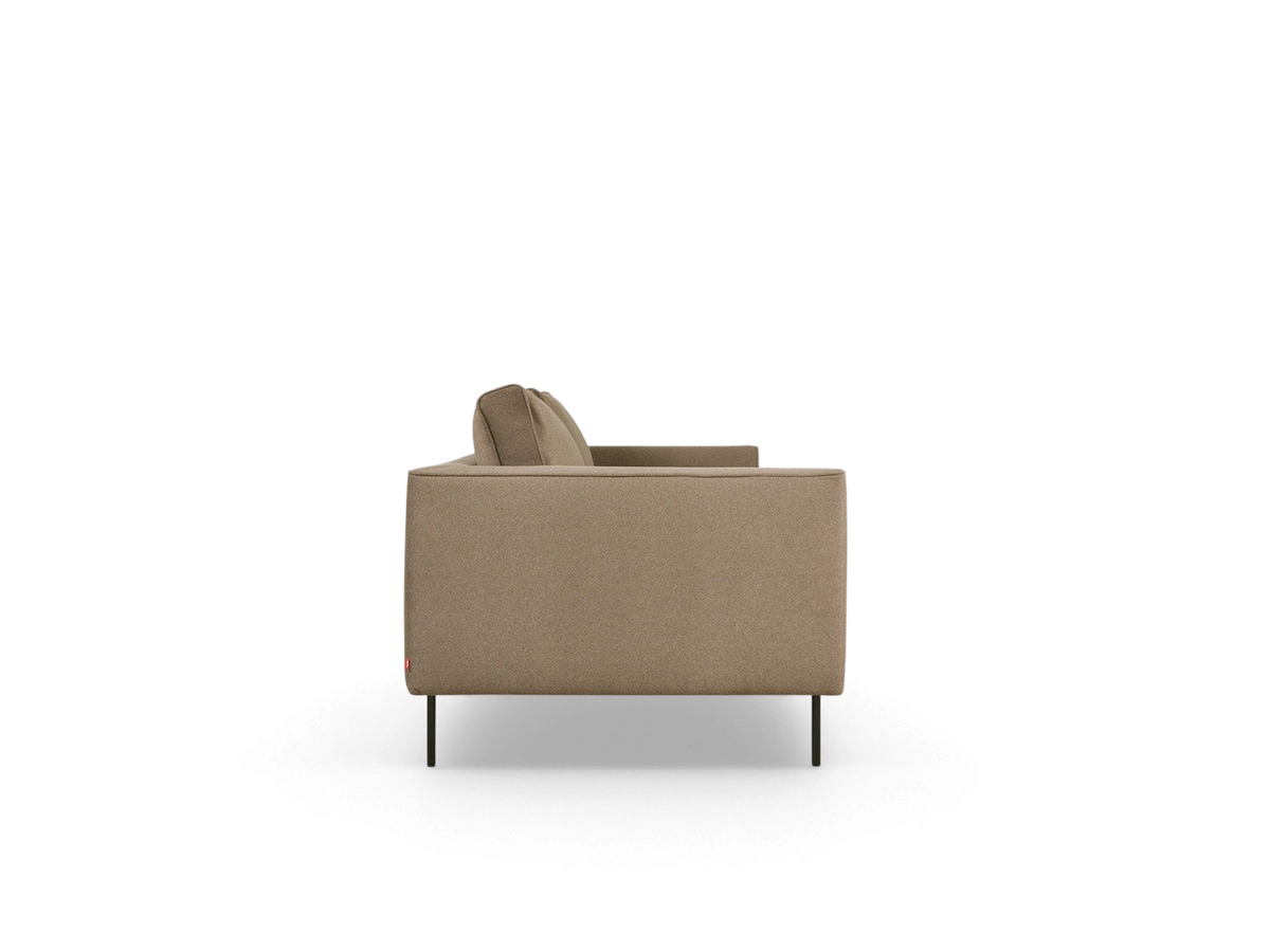 urbane EQ3 Renfrew sofa in a neutral fabric with a tuxedo frame and black powder-coated steel legs, side profile view