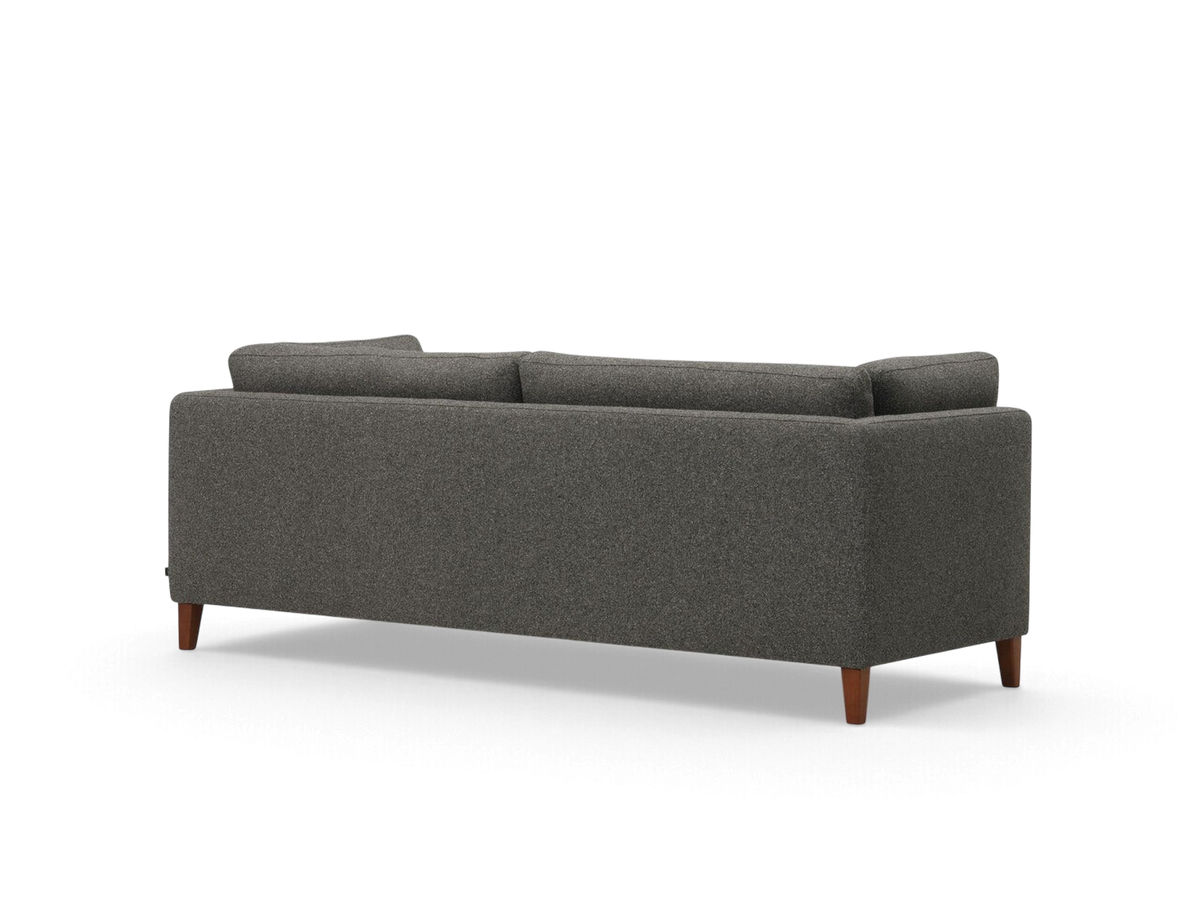 Back view of the urbane EQ3 Salema 87-inch sofa in dark grey fabric with tapered wooden legs