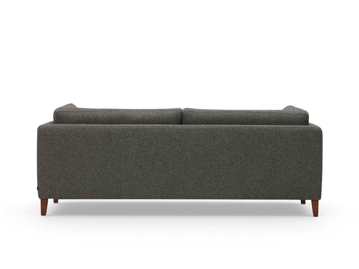 urbane EQ3 Salema 87 inch sofa in dark grey fabric with tapered wooden legs, back view