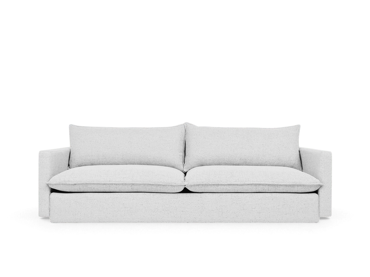 urbane EQ3 Sola Sofa in light grey fabric with French-seam detailing and plush cushions for a modern coastal look