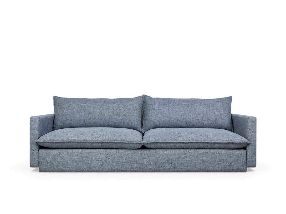 urbane EQ3 Sola Sofa in blue fabric with plush cushions, French-seam detailing, and a modern low-profile design.