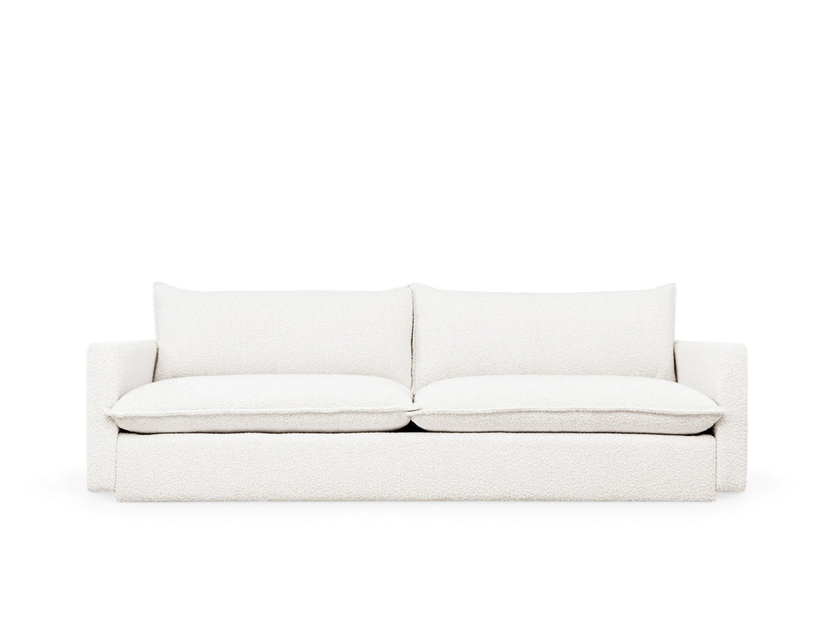 urbane EQ3 Sola Sofa in white textured fabric with French-seam detailing and a plush, modern low-profile design.