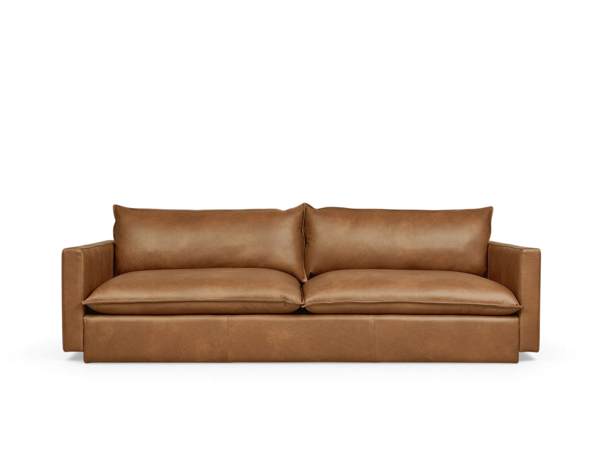 urbane EQ3 Sola Sofa in tan leather with French-seam detailing and a plush, low-profile contemporary design.