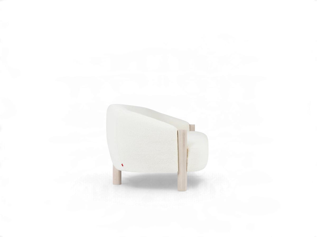 urbane EQ3 Spadina sofa in cream textured fabric with a curved back and light solid ash wood legs, side view