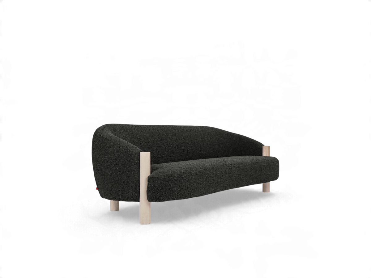 urbane EQ3 Spadina sofa in dark charcoal textured fabric with a curved back and light solid ash wood legs