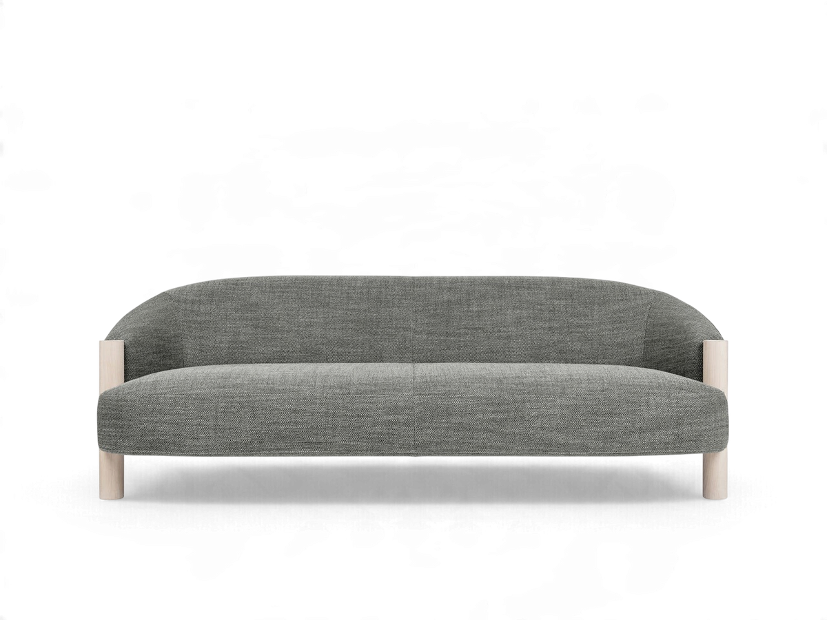 urbane EQ3 Spadina sofa in grey fabric with a curved backrest and sculpted solid ash wood legs