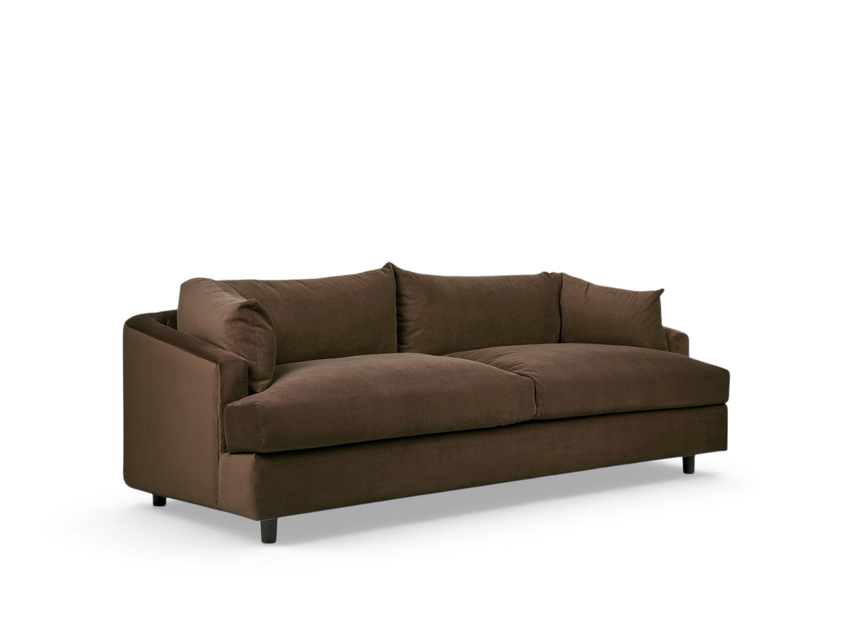 urbane EQ3 Thalia sofa in dark brown fabric with a modern 1970s-inspired wraparound cushion design