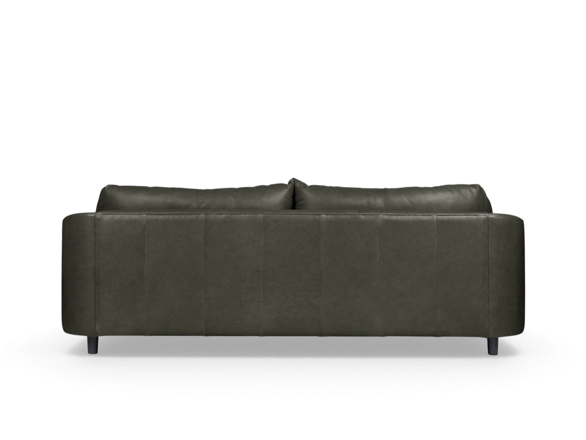 urbane EQ3 Thalia sofa in dark grey top grain leather with a 1970s-inspired wraparound design and inset feet.