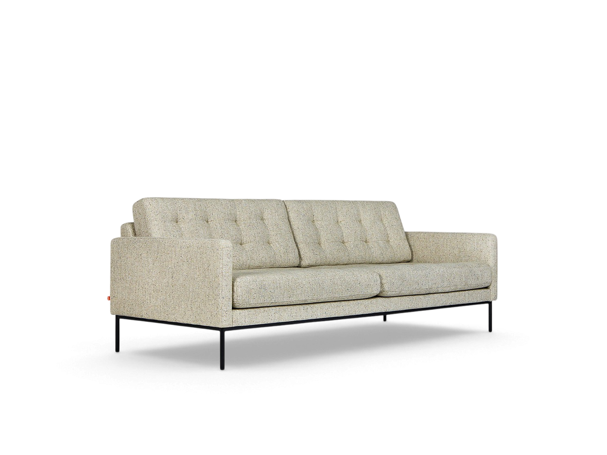urbane EQ3 Towne Sofa in light textured fabric with blind-tufted cushions and black powder-coated steel legs