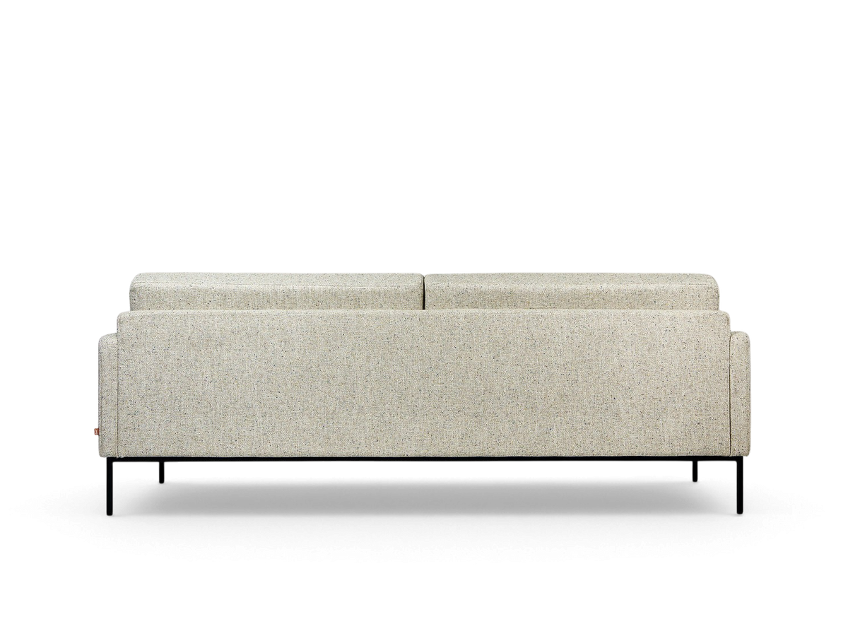 urbane EQ3 Towne Sofa in a light speckled fabric with a slender profile and black powder-coated steel legs