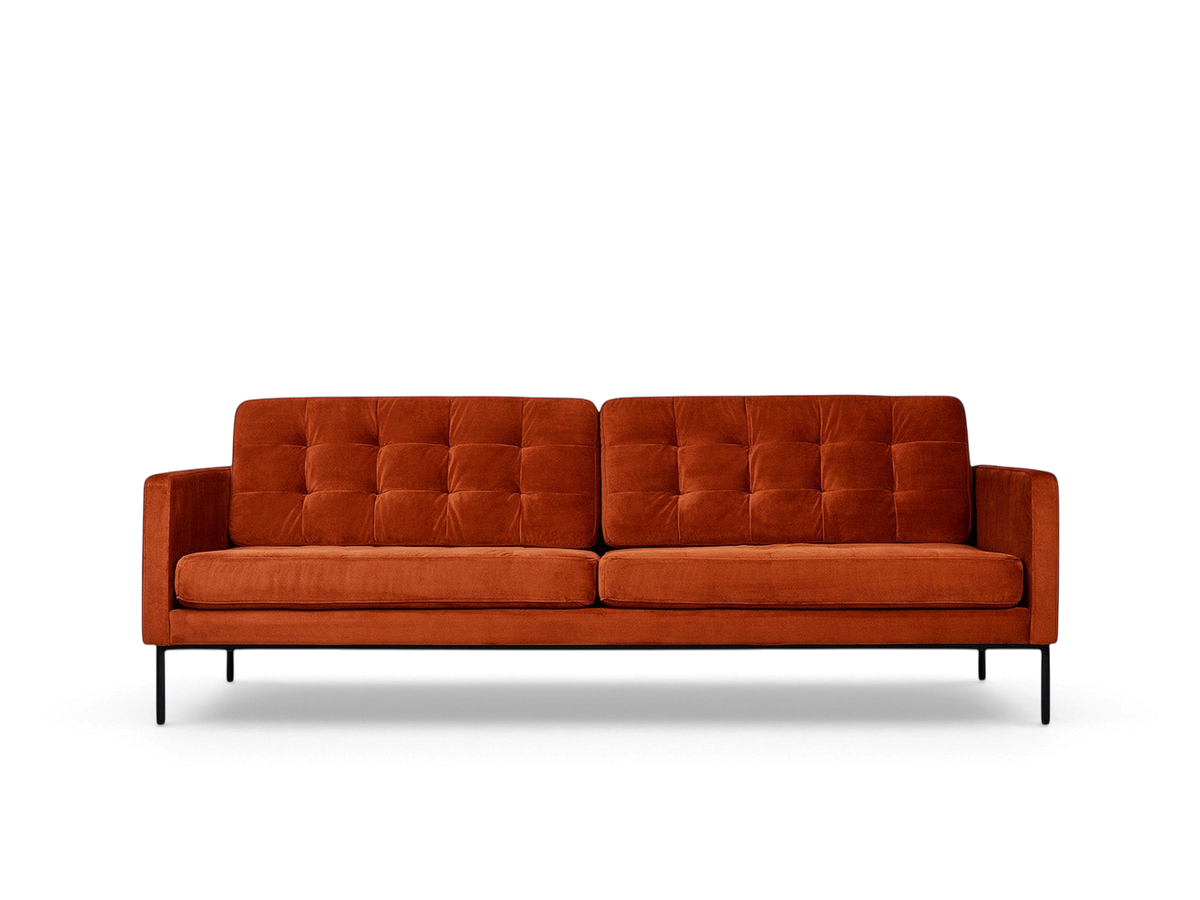 urbane EQ3 Towne Sofa in rust orange velvet with blind-tufted cushions and a slender black powder-coated metal base.