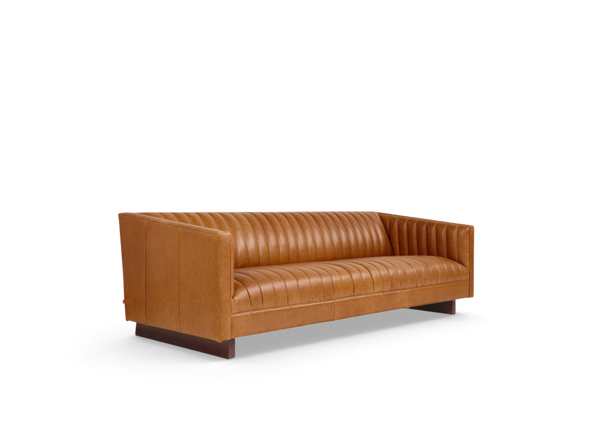 urbane EQ3 Wallace Sofa in tan top-grain leather with channel-stitched upholstery and a walnut-stained wooden base