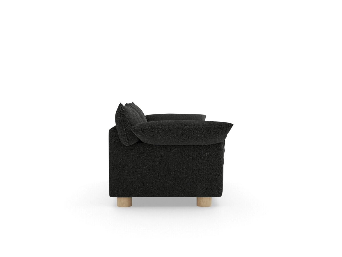 urbane EQ3 Zoe sofa in black fabric with French seams and light oak circular legs, side profile view