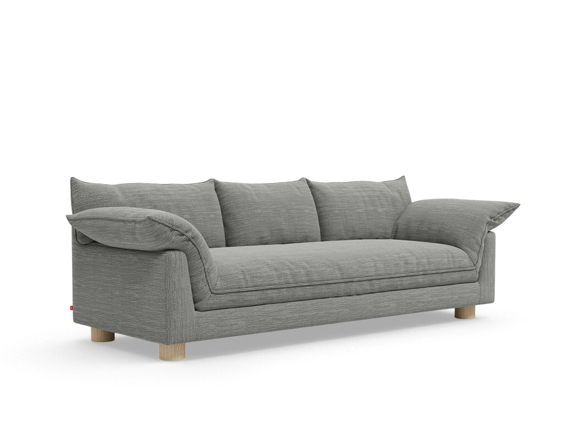 urbane EQ3 Zoe sofa in grey fabric with French seam detailing, deep seats, and light oak circular wood legs.