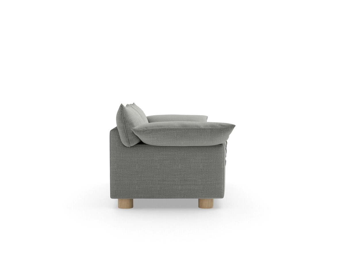 urbane EQ3 Zoe sofa in grey fabric with French seam detailing and light oak circular legs, side profile view.