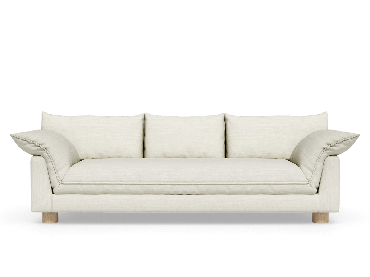urbane EQ3 Zoe sofa in cream fabric with French seam detailing and round oak legs, front view