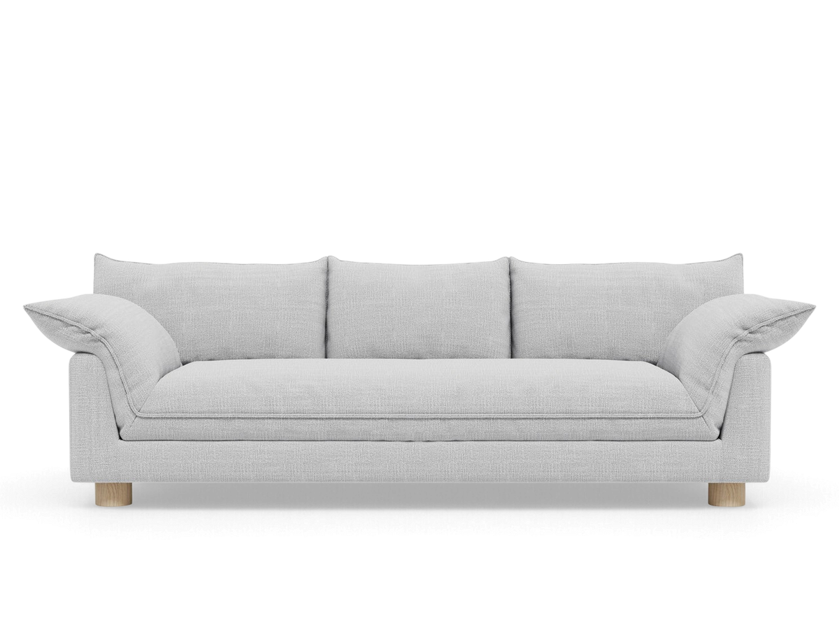 urbane EQ3 Zoe Sofa in light grey fabric with French seam detailing and round oak legs on a white background